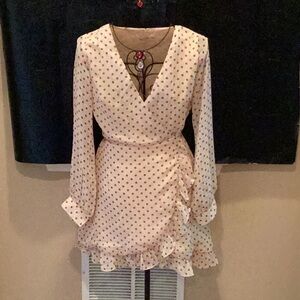 A little beige with polkadot dress.